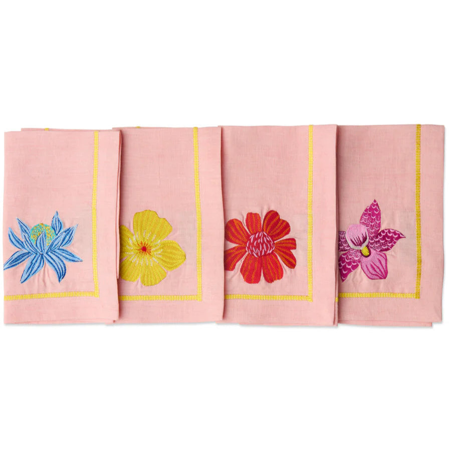 Set of four pink napkins with colorful floral embroidery on a white background