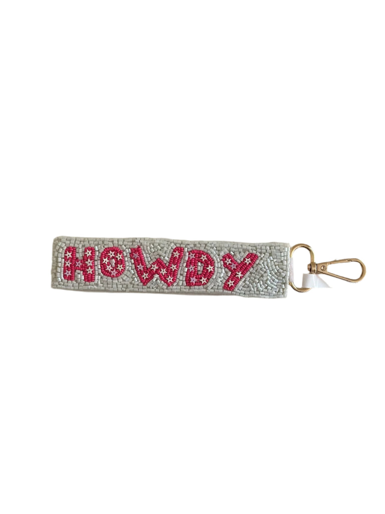 Keychain with 'HOWDY' text on a plain background