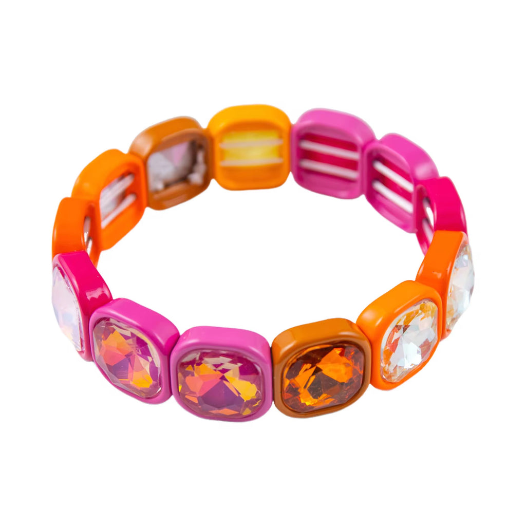 Colorful bracelet with orange, pink, and clear beads on a white background